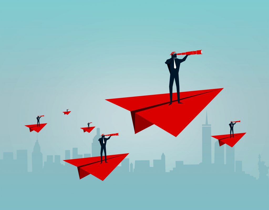 Businessmen riding paper airplanes - Business planning and strategy concept